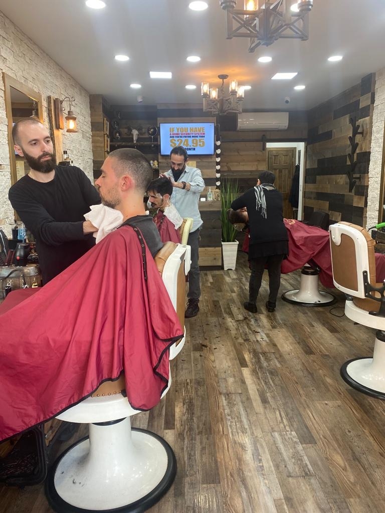 Are there any traditional grooming services that are still popular at NYC barbershops?